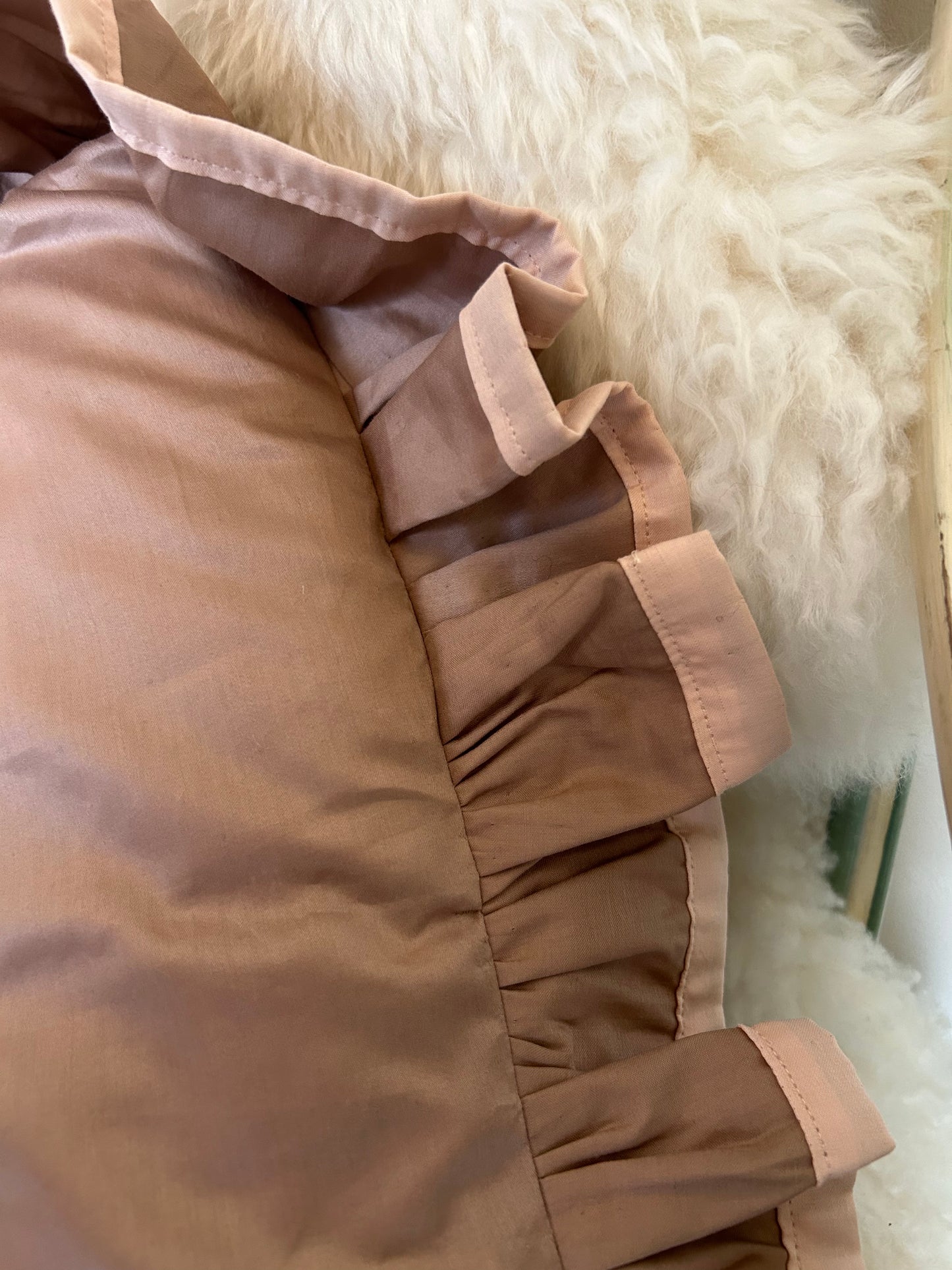 Two toned pink frilly cushion